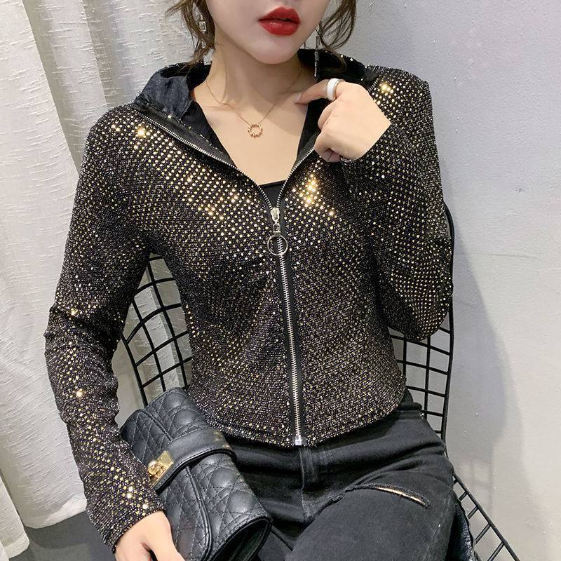 The Woman With The Short Coat Of Glitter