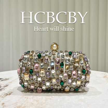 Luxurious Gold-colored Clutch With Dazzling Rhinestone Accents