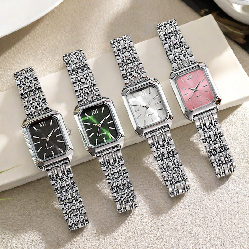 The Lady Is Just Wearing A Square Quartz Watch