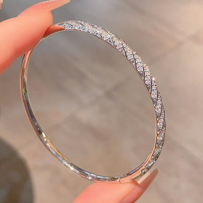 Diamond-encrusted Rhombus Bangle Smooth Surface Crisscross Design