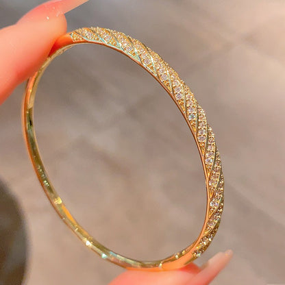 Diamond-encrusted Rhombus Bangle Smooth Surface Crisscross Design