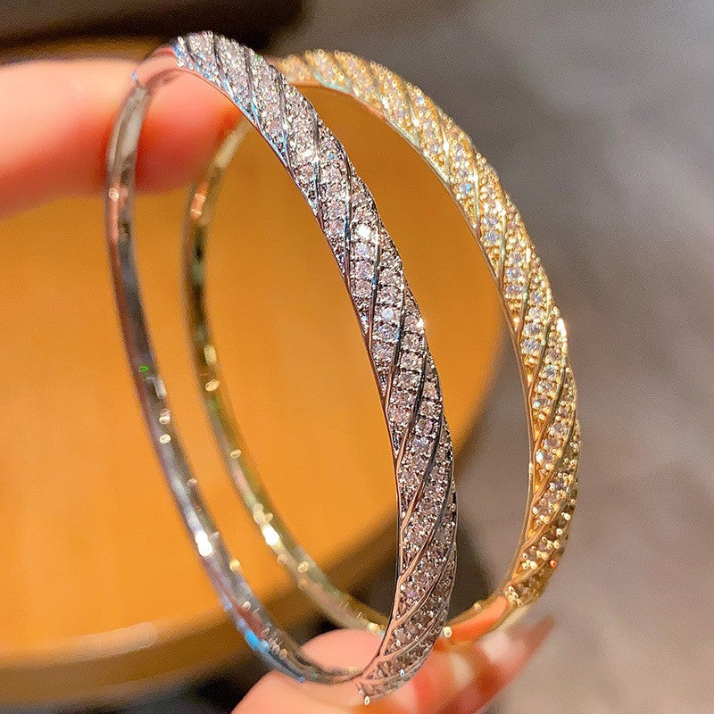 Diamond-encrusted Rhombus Bangle Smooth Surface Crisscross Design